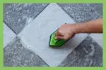 tile and grout cleaning with hands